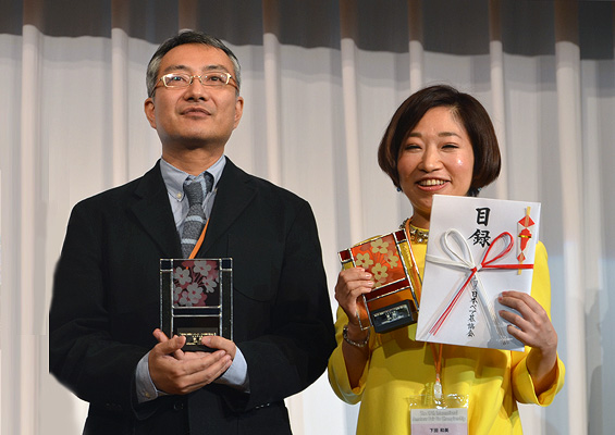 The JAPG winning pair: Ms. Kazumi Shimoda & Mr. Satoshi Tanabe (PANDANET Pair Go champions).